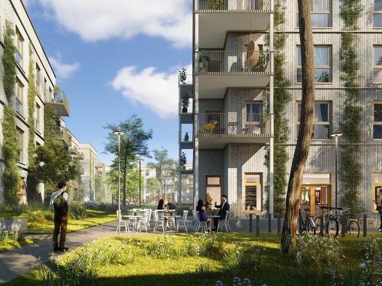 Moderne Appartementhäuser mit Balkonen überblicken einen Innenhof mit Menschen und Grünanlagen.