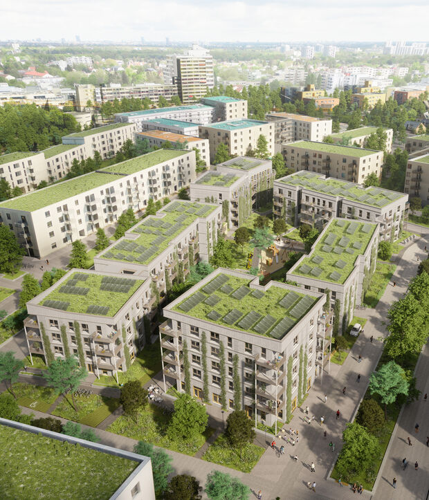 Luftaufnahme von modernen Wohngebäuden mit begrünten Dächern in einem städtischen Gebiet.